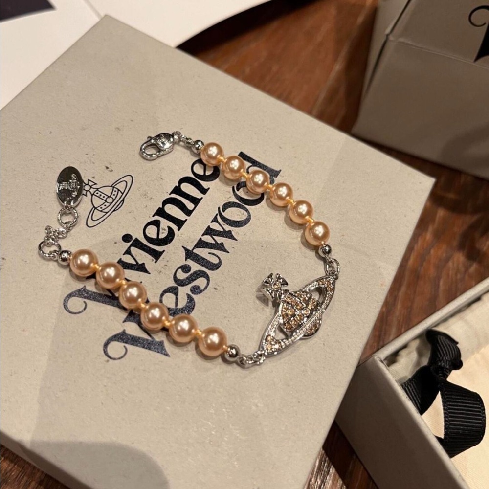 Vivienne Westwood Gold Pearl and Silver Orb Bracelet